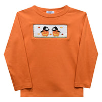 Orange smocked Jack-o’-lantern shirt