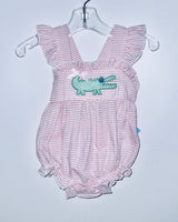 Pink seersucker alligator sunsuit